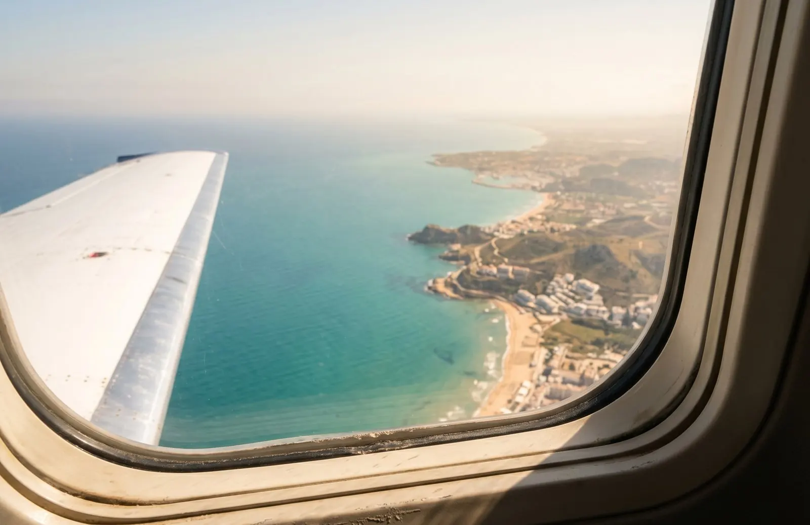 The Spanish Mediterranean coast seen from an aircraft window on approach